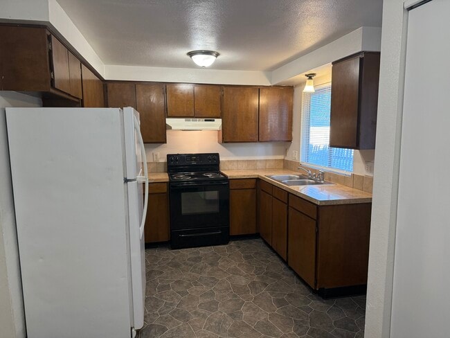 Building Photo - 2403 s kimball ave Unit  Rental