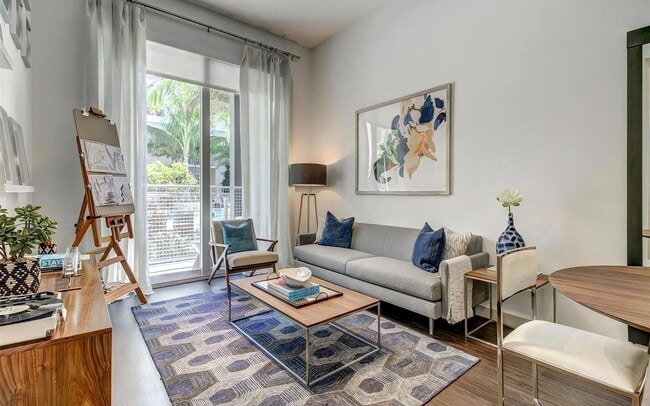 A patio door at ground level puts the courtyard right off the living room.
