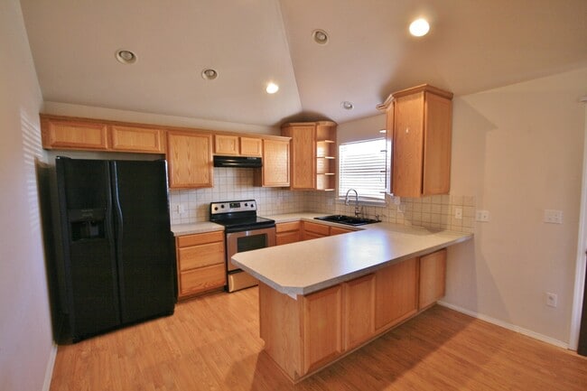 Photo - Xeriscaped Front Yard, Pets Welcome in Large Backyard