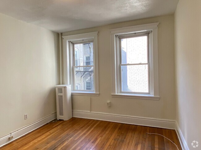 Building Photo - Nice sunny studio next to the Green Line! Rental