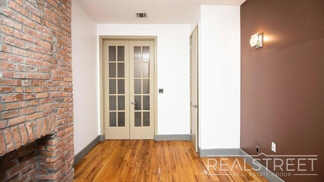 Photo - Gut-Renovated 3BR + Massive Finished Basement | Backyard, Laundry & HVAC | Bushwick Unidad 1L