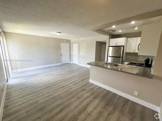 Building Photo - 11777 NW 30th St Unit 206 Rental