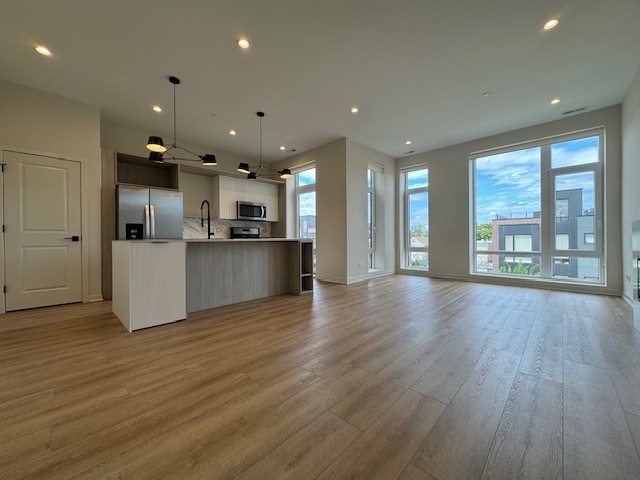 Building Photo - 4177 W Belmont Ave Unit #  0104