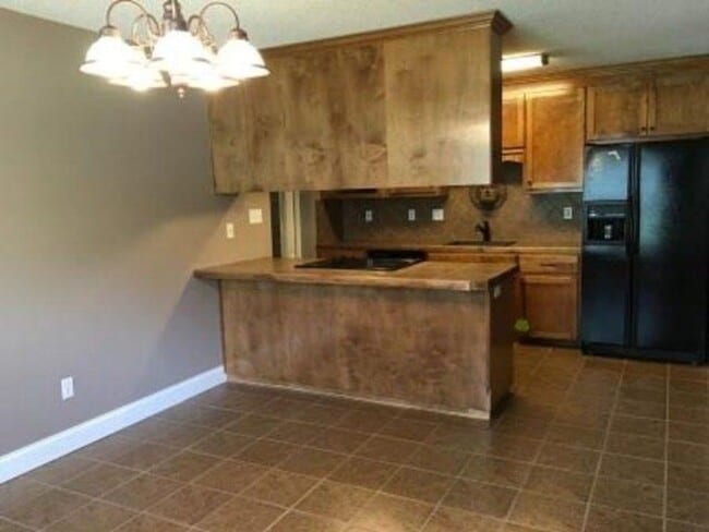 Photo - Spacious 3BR Brick Home with Open Split Floor Plan & Tiled Back Porch on Nearly an Acre