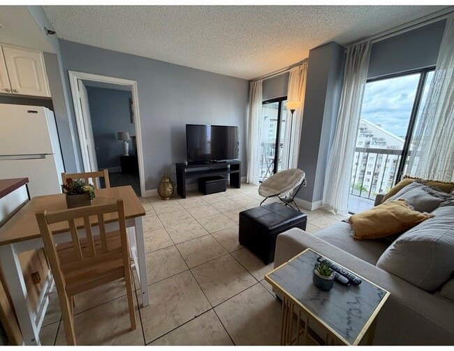 Building Photo - 6165 Carrier Dr Unit 1903