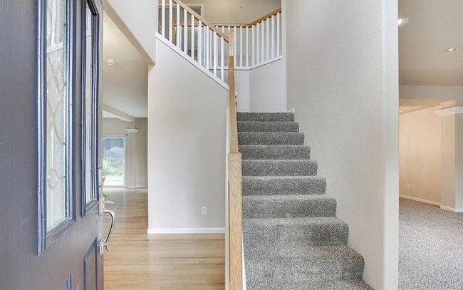 Photo - Spacious Four-Bedroom Home with Gourmet Kitchen, Multiple Living Areas, Loft, and Beautifully Lan...
