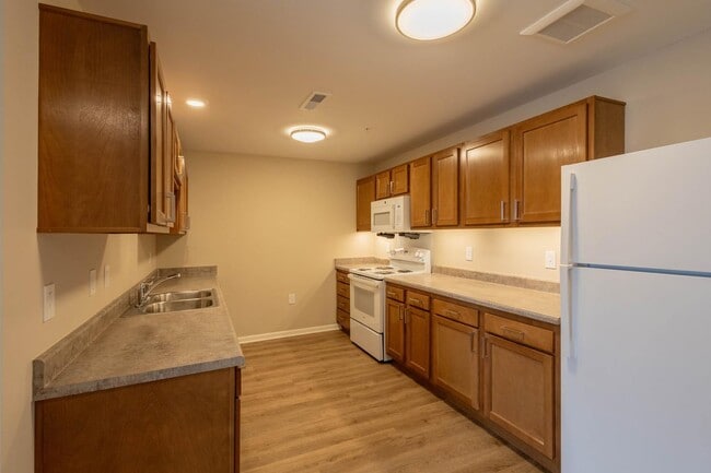 Munson Crossing - Munson Crossing Apartments