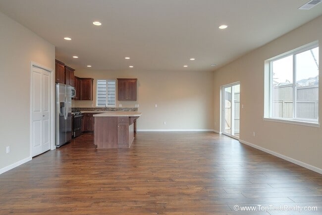 Photo - Spacious 4-Bedroom + Office Home in Abbey Creek – Modern Finishes, EV Charger & Low-Maintenance B...