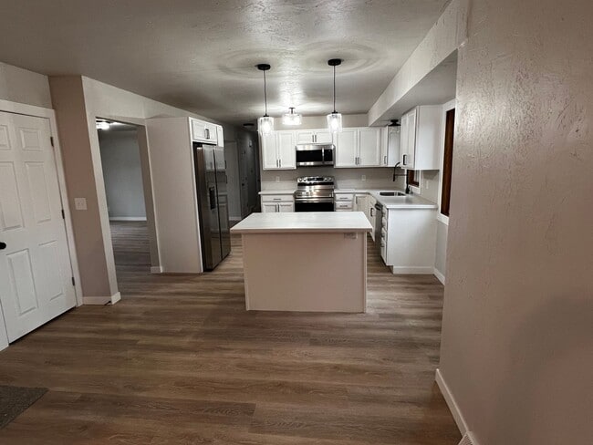 Photo - Spacious 4-Bedroom Home with Finished Basement & Garage