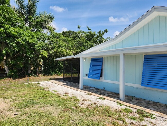 Building Photo - Coastal Charm Awaits in Bonita Springs