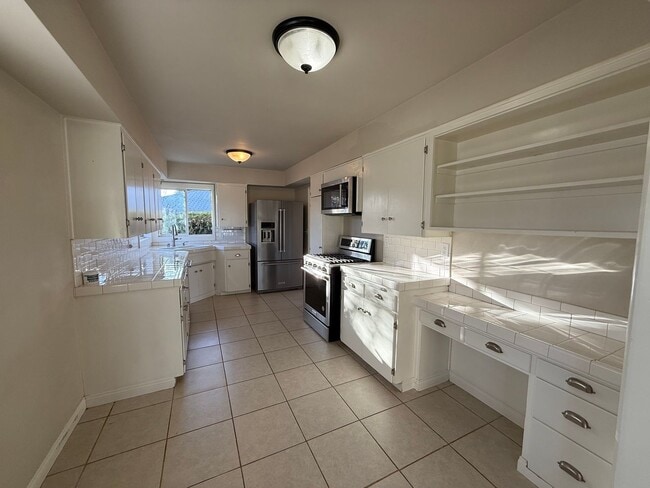 Photo - Flexible Living 4 Bedroom Home with Pool & Garage