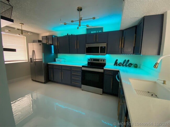 8891 Wiles Rd Unit 208
