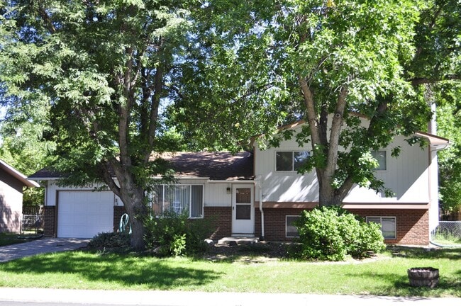 Building Photo - Close to CSU! 3 Bed Home with Fenced Yard & Garage