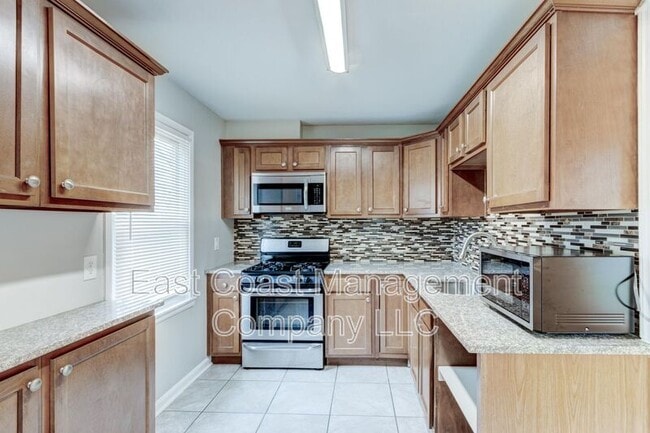 Building Photo - 8529 Ramort Dr Unit Condo  22A