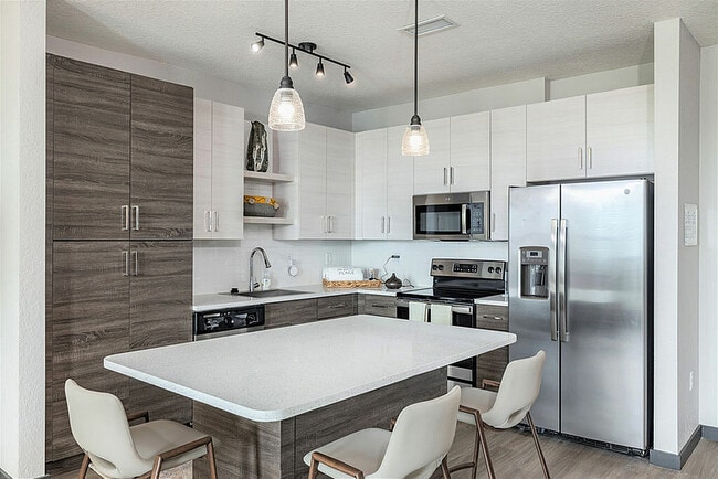 Experience the elegance of this contemporary kitchen, perfect for culinary creativity and entertaining.