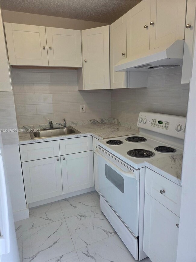 Building Photo - 7275 W 24th Ave Unit 240