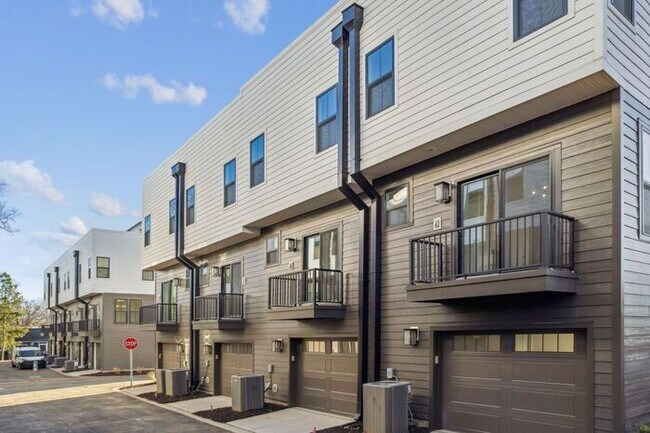 Photo - High-End 2BR Townhome | Rooftop Terrace + 2-Car Garage | 24-Unit Community