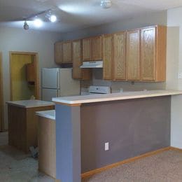 Kitchen and half bath - 13040 Europa Trail Way N Townhome