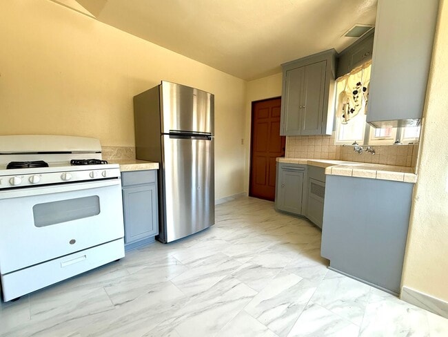 Photo - Cozy Two Bedroom Duplex w/ Hardwood Floors! Lovely Kitchen! Lots of Natural Light! Unit 2687 Reynard Way