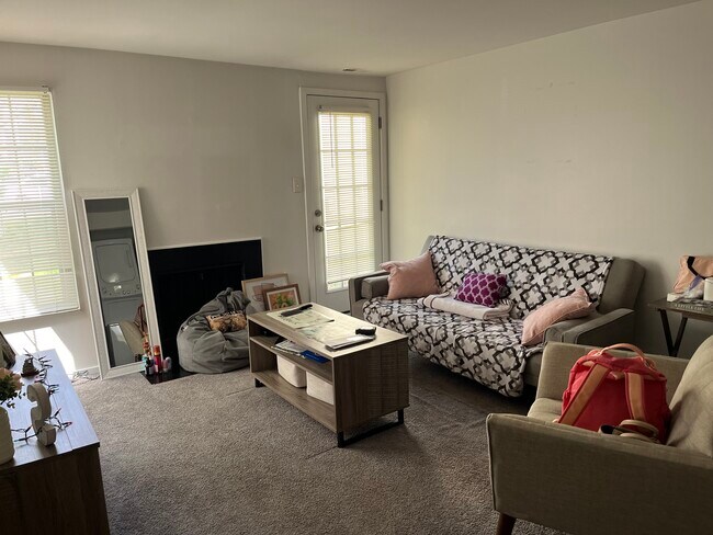 Large nice live room with fireplace and walkout patio - 229 Meadow Ridge Rd Unit Fox Chase Smithville NJ