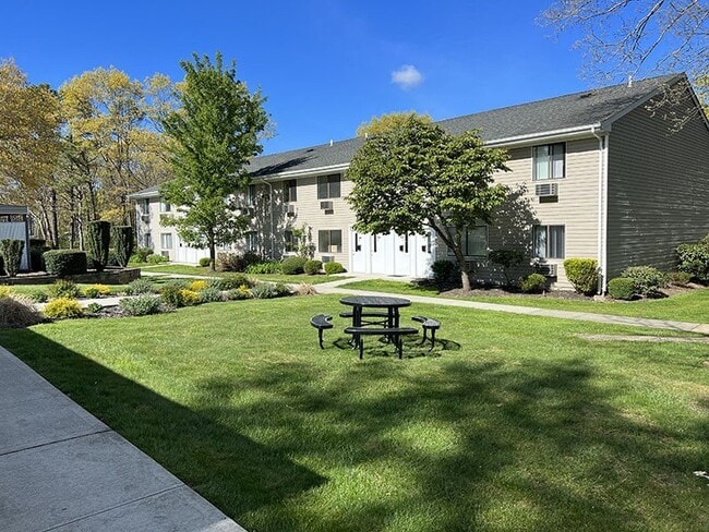 Beautiful green area in front of apartment building