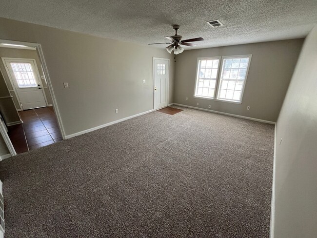 Photo - 3BR/2BA Memphis Rental with Bright Open Living Room & Fenced Yard