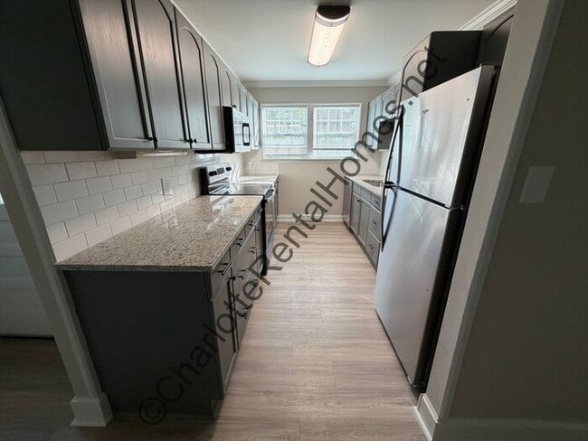 Photo - Updated 4 bedroom 2 bathroom home with back deck & large storage shed in Gastonia!