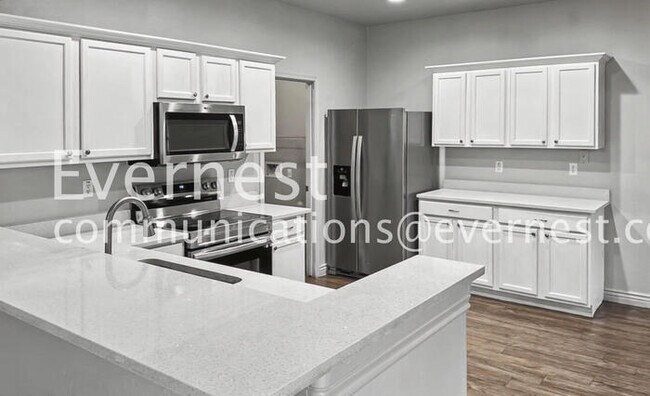 Photo - Limited Time Special Offer / 4 Bed, 3 Bath Home with Garage / Pet-Friendly / Vouchers Accepted / ...