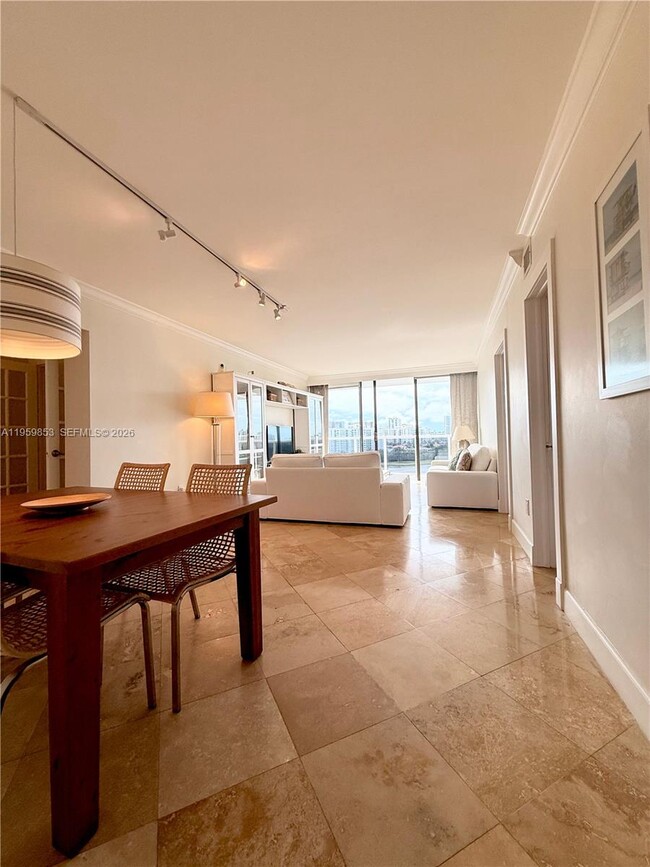 Building Photo - 3675 N Country Club Dr Unit 1204