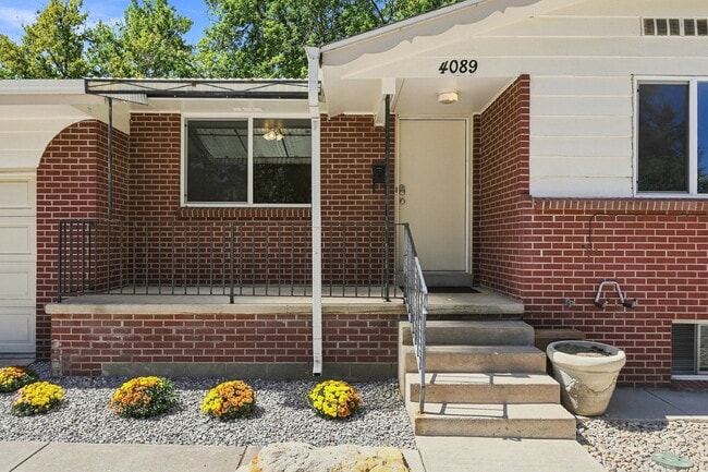 Photo - AVAILABLE NOW
Spacious 4-Bedroom Wheat Ridge Home with Finished Garden Level, Two-Car Garage & B...