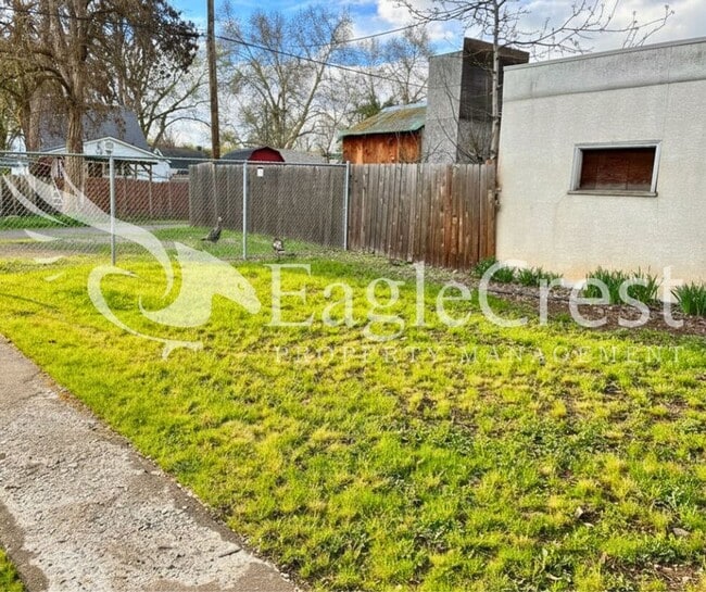 Charming 3BR Home with Spacious Yard & Bonus Living Space! $200.00 OFF 2nd Month Rent!!