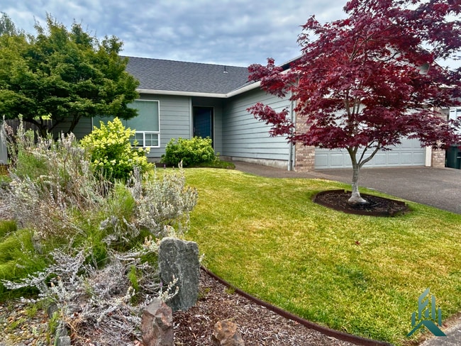 Photo - Beautiful 3 Bed, 2 Bath Home with Solar Panels, Landscaping Included & 2-Car Garage
