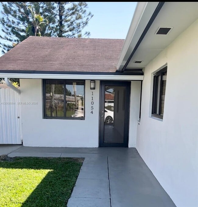 Building Photo - 11050 SW 5th St Unit 11056