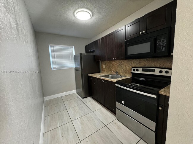 Building Photo - 1940 Washington Ave Unit 12 Rental
