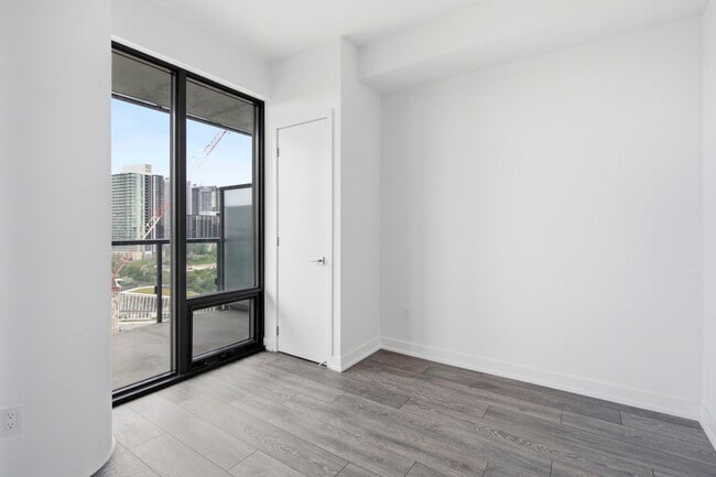 Building Photo - The Residences at Central Park Unit 1211
