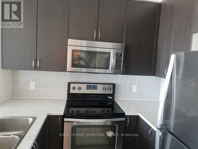 Photo - 339 Rathburn Rd W Unit PH-03
