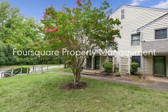 Photo - Charming 1st-Floor End-Unit Condo with Gas Log Fireplace, Private Back Porch & Community Pool – T... Unit 110