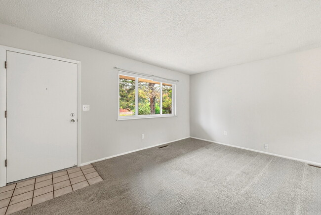 Photo - $1,945.95- 3-bed/1.5-bathroom home in Colorado Springs with a spacious fenced-in yard!