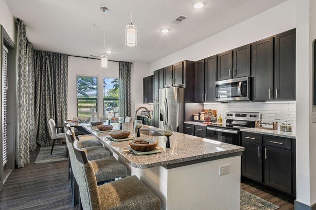 Modern kitchen with elegant finishes. - Windsor Lakeyard District Apartments