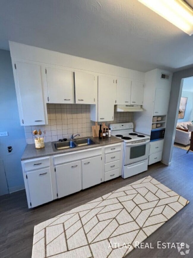 Building Photo - 5430 W 3rd Pl Unit 03 Rental