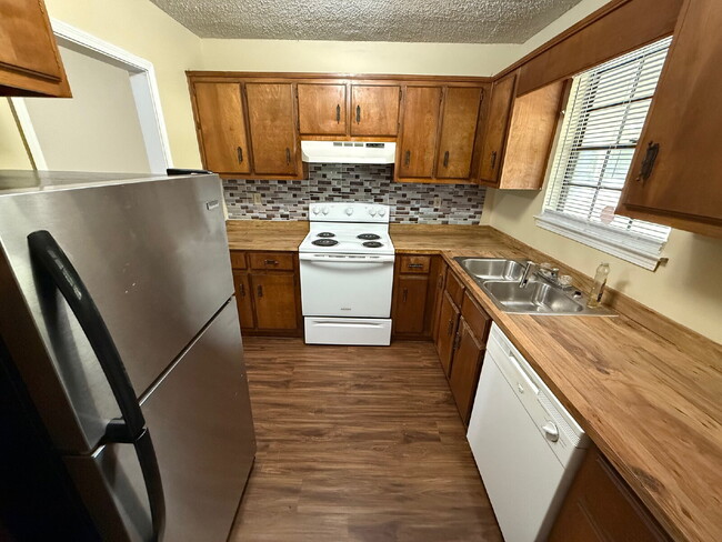 Photo - Freshly painted unit. Positioned along Navco Road, the home offers convenient access to major rou...