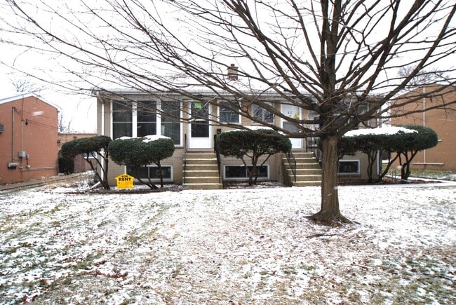 Building Photo - 417 W Stone Ave Unit A