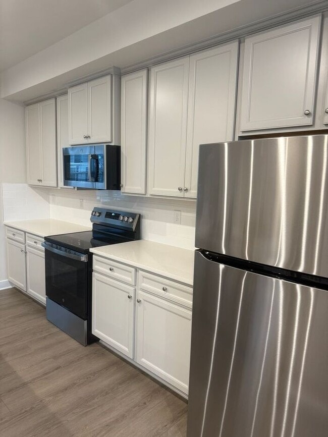 Photo - Brand New 3BR 2.5BA Townhome w/ 2-Car Garage • Modern Kitchen • Private Deck in Indian Trail!