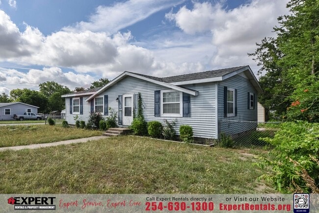 Photo - A cozy 3-bedroom, 2-bathroom home nestled on a corner lot