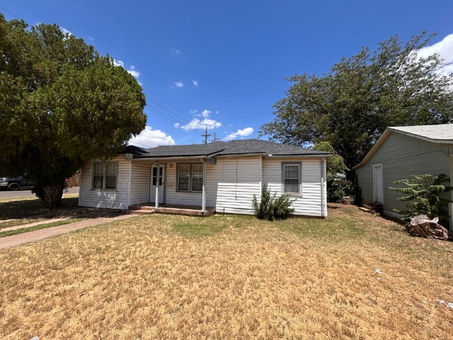 Photo - "Charming 4-Bed, 2-Bath Home