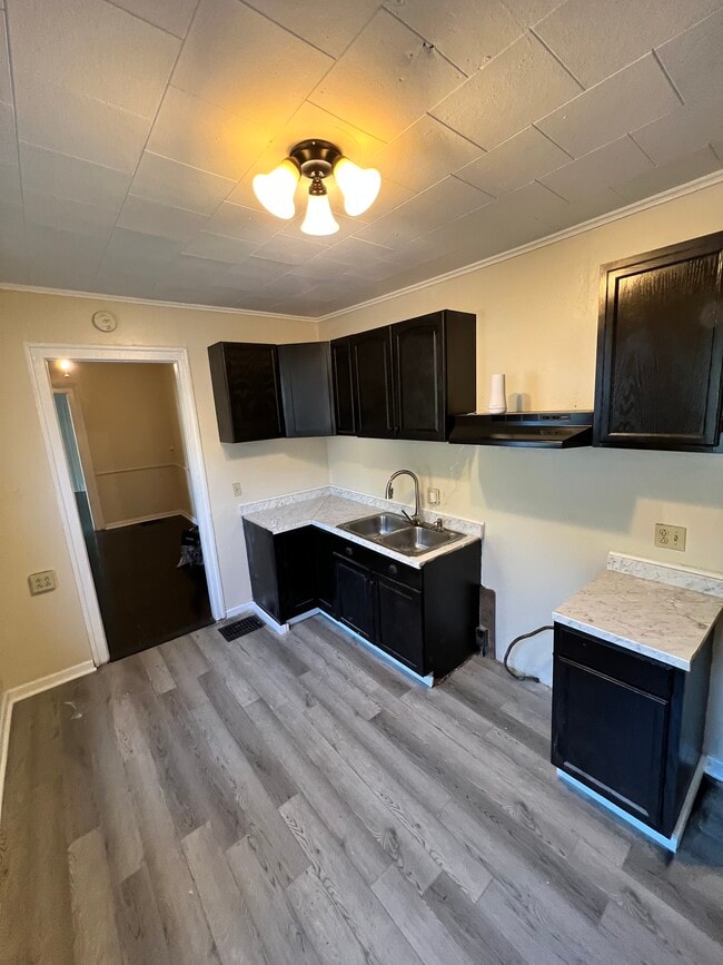 Photo - 114 Dr Samuel McCree Way Unit Downstairs