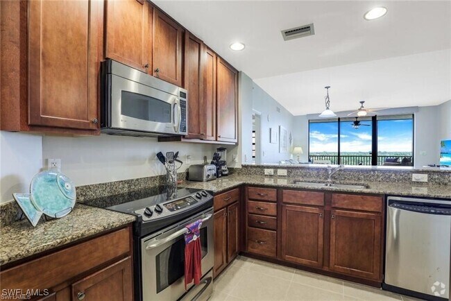 Building Photo - 5793 Cape Harbour Dr Unit 716 Rental