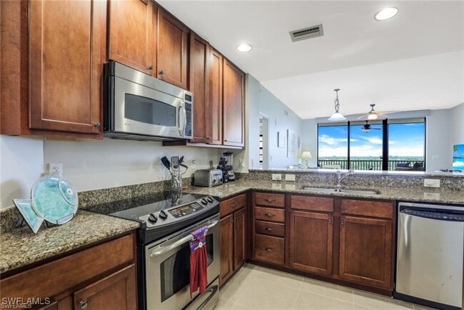 Building Photo - 5793 Cape Harbour Dr Unit 716 Rental