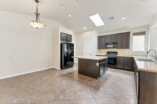 Photo - "Charming 3-Bed Oasis with 2 Baths in Henderson – 1716 Sq Ft of Comfort!"