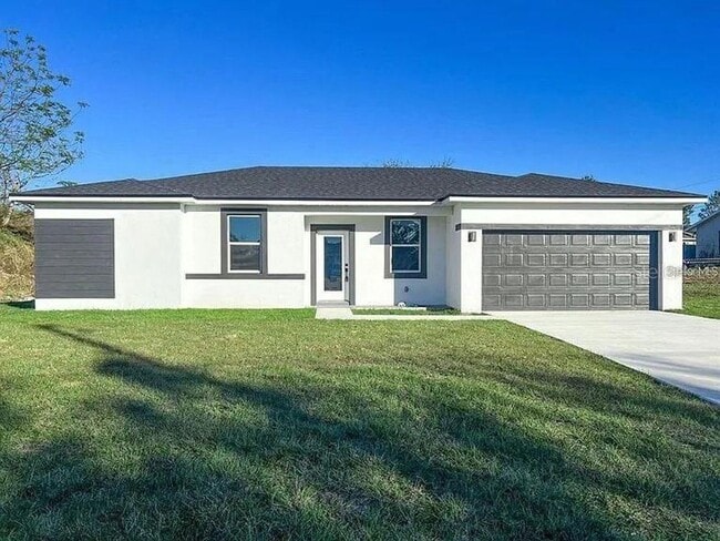Building Photo - This new home has all the extras you have ...
